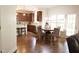 Eat-in kitchen area boasting a round table, natural light, and modern cabinetry at 309 Forest Haven Drive Dr, Holly Springs, NC 27540