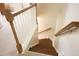Wooden staircase featuring a combination of carpet and hardwood steps at 309 Forest Haven Drive Dr, Holly Springs, NC 27540