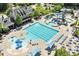Aerial view of community pool area with lap pool, splash pad, and lounge chairs at 309 Larkhaven Pl, Apex, NC 27539