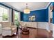 Comfortable living room featuring hardwood floors, natural light, and neutral color palette for inviting appeal at 309 Larkhaven Pl, Apex, NC 27539