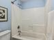 Bathroom with a white shower-tub combo and blue walls at 309 Plank Bridge Way, Morrisville, NC 27560