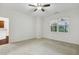 This bedroom with carpet floors has a bright window overlooking the neighborhood at 309 Plank Bridge Way, Morrisville, NC 27560
