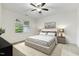 Serene bedroom with a neutral color palette, a large window, and comfortable furnishings for relaxation at 309 Plank Bridge Way, Morrisville, NC 27560