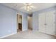 Carpeted bedroom with blue walls and access to a bathroom and closet at 309 Plank Bridge Way, Morrisville, NC 27560