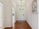 Inviting entryway with hardwood floors and a view of the living area at 309 Plank Bridge Way, Morrisville, NC 27560