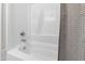 Clean white bathtub with chrome fixtures and a neutral shower curtain offers a relaxing space at 310 Bay Dr, Cary, NC 27511