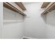A walk-in closet with plenty of space and built-in shelving for organized storage at 310 Bay Dr, Cary, NC 27511