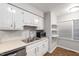 Kitchen view featuring modern appliances, countertops, and storage shelving at 310 Bay Dr, Cary, NC 27511