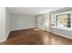 Inviting living room with hardwood floors, bright windows, and neutral walls at 310 Bay Dr, Cary, NC 27511