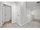 Hallway view showing access to a laundry room with washer and dryer hookups at 32 Freedom Heights Ln # 151, Smithfield, NC 27577