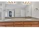 Double sink bathroom vanity featuring granite countertops and ample storage space at 3449 S Beaver Ln, Raleigh, NC 27604