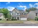 Charming two-story home with attached garage, well-maintained lawn, and inviting curb appeal at 3449 S Beaver Ln, Raleigh, NC 27604