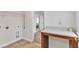 Laundry room offers a utility sink, folding counter, and washer and dryer hookups at 3449 S Beaver Ln, Raleigh, NC 27604