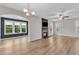 Bright living room with hardwood floors, fireplace, and plenty of natural light at 3449 S Beaver Ln, Raleigh, NC 27604