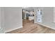 Spacious open floor plan featuring kitchen and living room with hardwood floors at 3449 S Beaver Ln, Raleigh, NC 27604
