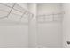Walk-in closet features white walls and wire shelving at 3449 S Beaver Ln, Raleigh, NC 27604