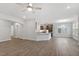 Expansive living area showcasing an open layout and kitchen with modern cabinetry at 347 N. Maple Walk Dr # 211, Garner, NC 27529