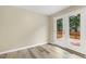 Bedroom showcasing a view of the deck from the glass doors at 366 E Smithfield St, Angier, NC 27501