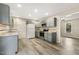 Updated kitchen featuring gray cabinets, stainless steel appliances, and modern fixtures at 366 E Smithfield St, Angier, NC 27501