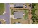 Aerial view of home with big yard, firepit, adjacent houses and neighborhood streets, and a private driveway at 40 Bourne Dr, Franklinton, NC 27525