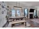 Cozy dining area features a wooden table with bench seating and access to the outdoor space at 40 Bourne Dr, Franklinton, NC 27525