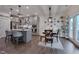 Kitchen and dining area with seating and modern appliances, offering an inviting and functional space at 40 Bourne Dr, Franklinton, NC 27525