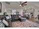 Open-concept living room flows into a kitchen with stainless appliances and an island with seating at 40 Bourne Dr, Franklinton, NC 27525