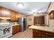 Bright kitchen featuring stainless steel appliances, ample storage and breakfast area at 4004 Bamburgh Ln, Apex, NC 27539