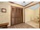 Eat-in kitchen area features a pantry with wood cabinets, and laminate flooring at 4004 Bamburgh Ln, Apex, NC 27539