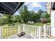 Covered deck in fenced-in backyard perfect for relaxing or entertaining guests at 4024 Rural Retreat Rd, Burlington, NC 27215