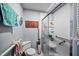 Bathroom with a shower, grab bars, a comfortable toilet, and functional fixtures at 4024 Rural Retreat Rd, Burlington, NC 27215