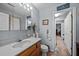 Bathroom with a single sink vanity and a separate toilet room, offering functionality and privacy at 4024 Rural Retreat Rd, Burlington, NC 27215