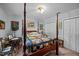 Bedroom featuring a four-poster bed, providing a relaxing and inviting retreat at 4024 Rural Retreat Rd, Burlington, NC 27215