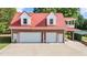 Three car detached garage with red roof, white trim and adjacent carport at 4024 Rural Retreat Rd, Burlington, NC 27215