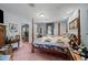 Relaxing main bedroom with soft lighting, a decorative bed frame, and a serene atmosphere at 4024 Rural Retreat Rd, Burlington, NC 27215