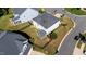 Aerial view of the backyard featuring a screen porch, green grass, and a fence at 408 Torwood Cir, Apex, NC 27523