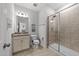 Bathroom featuring a glass-enclosed shower and granite vanity at 408 Torwood Cir, Apex, NC 27523
