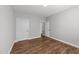 Empty bedroom with hardwood floors and neutral paint at 408 Torwood Cir, Apex, NC 27523