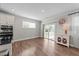Bright dining area with sliding glass doors and modern lighting at 408 Torwood Cir, Apex, NC 27523