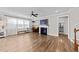 Cozy living room with a fireplace, large window and stylish decor at 408 Torwood Cir, Apex, NC 27523