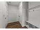 Functional mud room with built-in storage and coat hooks at 408 Torwood Cir, Apex, NC 27523