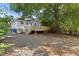 Home exterior with large back deck and spacious yard at 409 N Hyde Park Ave, Durham, NC 27703