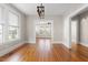 Dining room boasting hardwood floors, modern lighting, and seamless transitions to other rooms at 409 N Hyde Park Ave, Durham, NC 27703