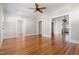 Generously sized living room boasting hardwood floors and seamless transitions to other rooms at 409 N Hyde Park Ave, Durham, NC 27703