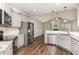 Modern kitchen with stainless steel appliances, granite countertops, and wood floors at 41 Tan Oak Dr, Selma, NC 27576