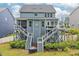 This backyard features multi-level decks, green landscaping, and a great outdoor entertaining space at 421 Gilpin Way, Cary, NC 27519