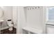 Powder room featuring pedestal sink, toilet, and coat rack at 421 Gilpin Way, Cary, NC 27519