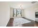 Bedroom featuring wood floors, area rug, and natural light at 421 Gilpin Way, Cary, NC 27519