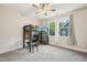 This bedroom has a loft bed, desk, ceiling fan, and two windows at 421 Gilpin Way, Cary, NC 27519