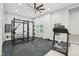 Home gym equipped with workout equipment, neutral paint, and ceiling fan at 421 Gilpin Way, Cary, NC 27519